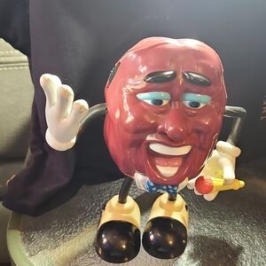 Charming Red Singing Figurine